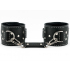 Чёрные кожаные наручники с крупной строчкой