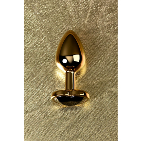 Золотистая анальная пробка с черным кристаллом-сердечком